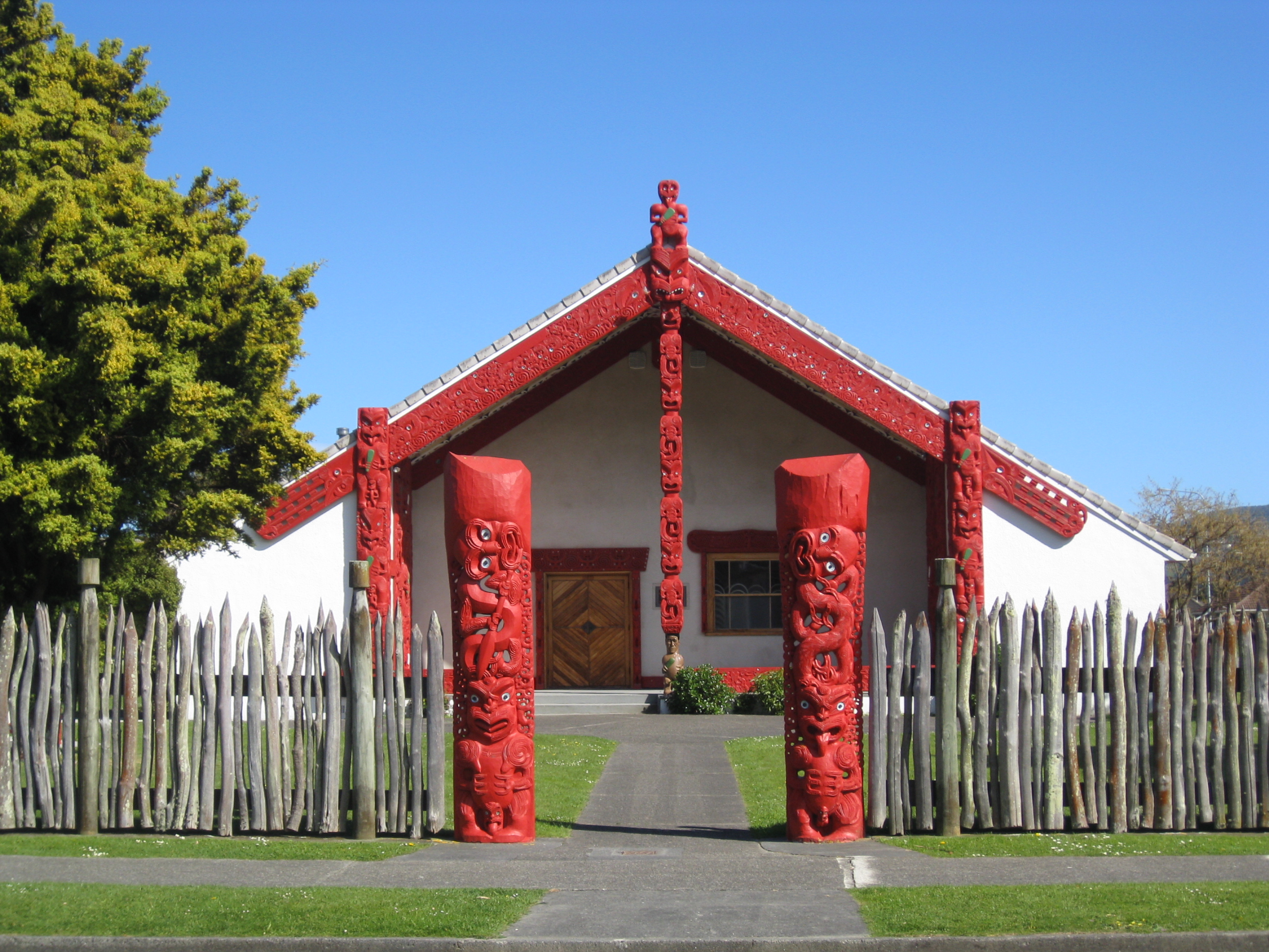 View of Waiwhetū Marae from the street, including the fence and waharoa